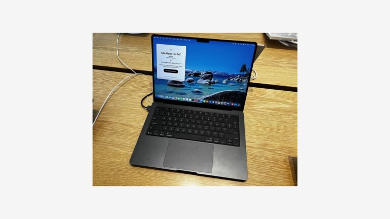 MacBook Pro on a desk, representing Apple upcoming M6 chip