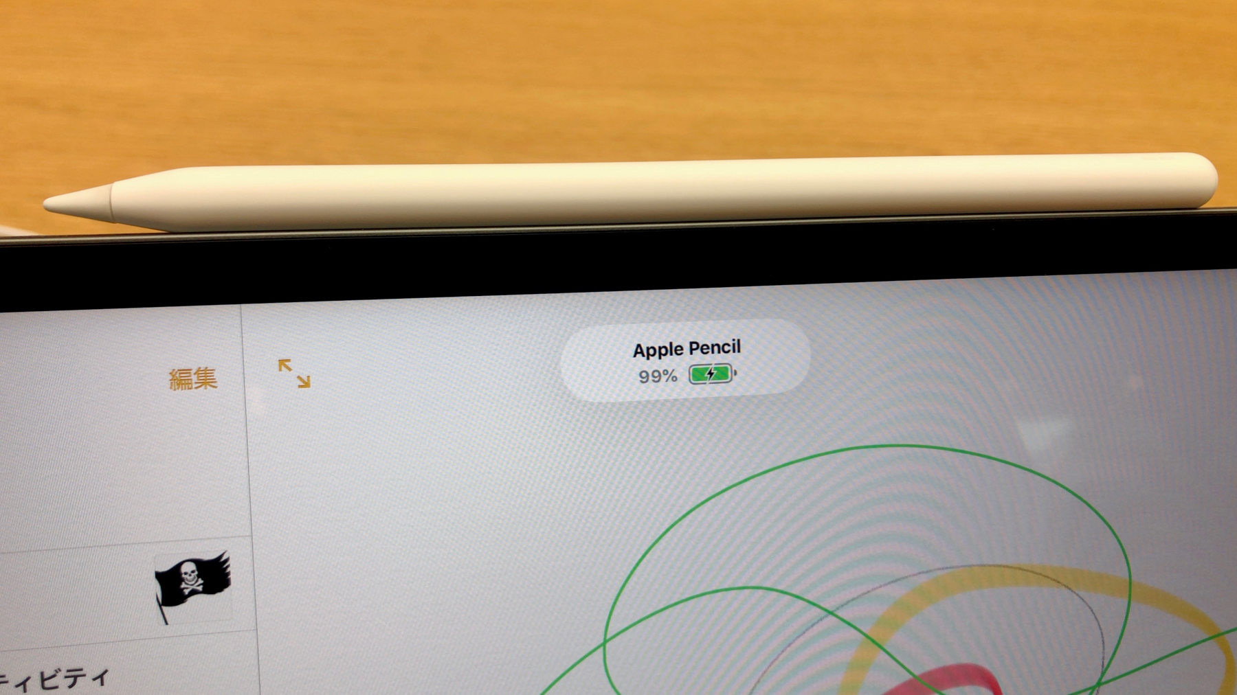 Apple Pencil charging popup showing 99 percent battery on an iPad