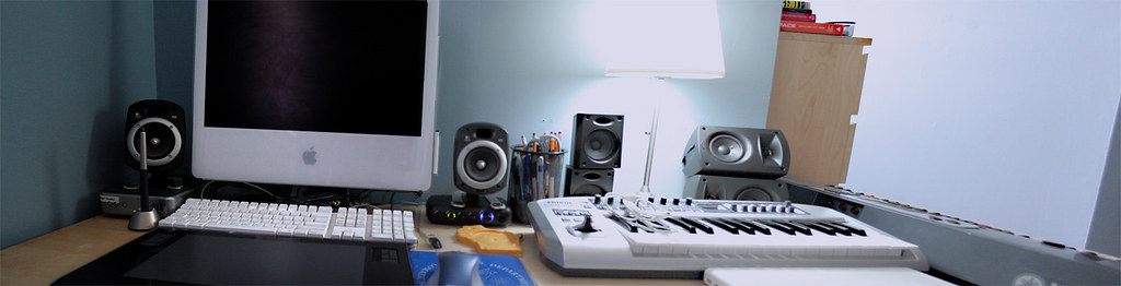 MacBook connected to an external monitor on a desk