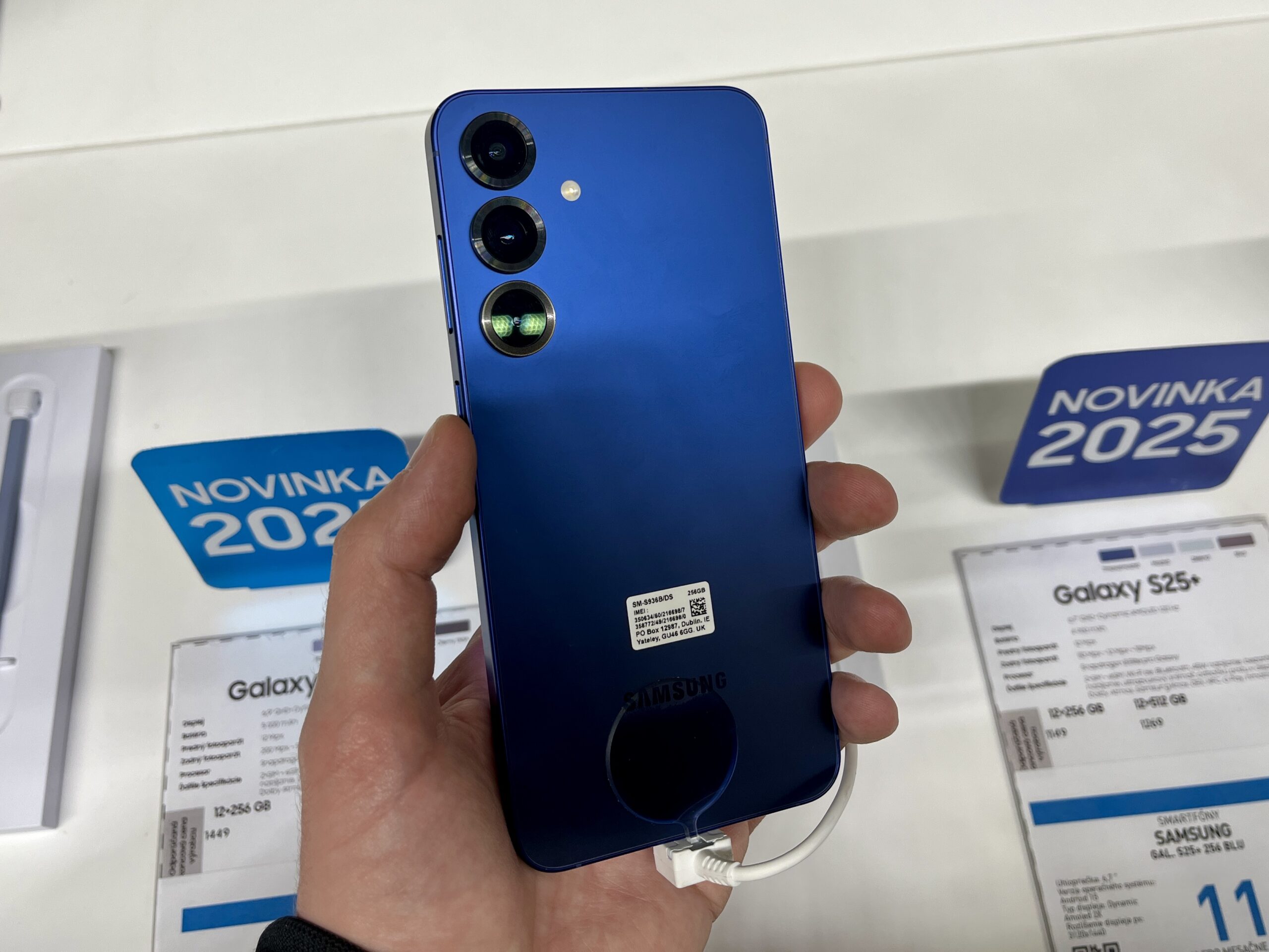 Samsung Galaxy S25 Plus held in hand showing the rear camera