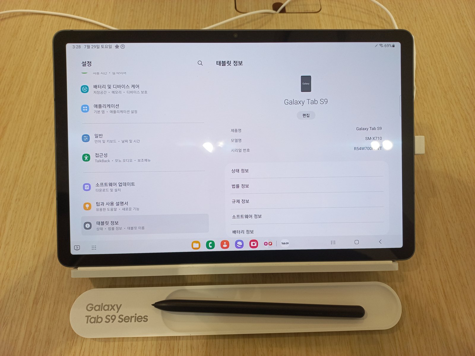 Samsung Galaxy Tab S9 Android tablet on a display stand with S Pen