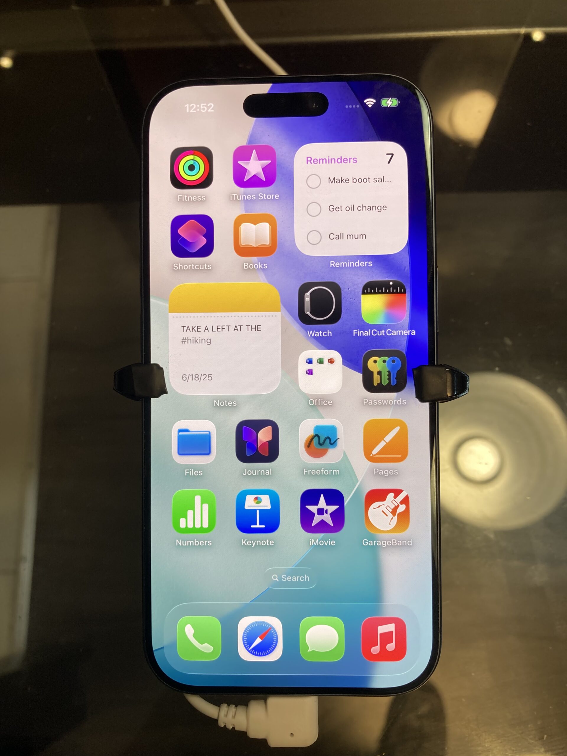Modern iPhone home screen showing the Messages app icon in the dock
