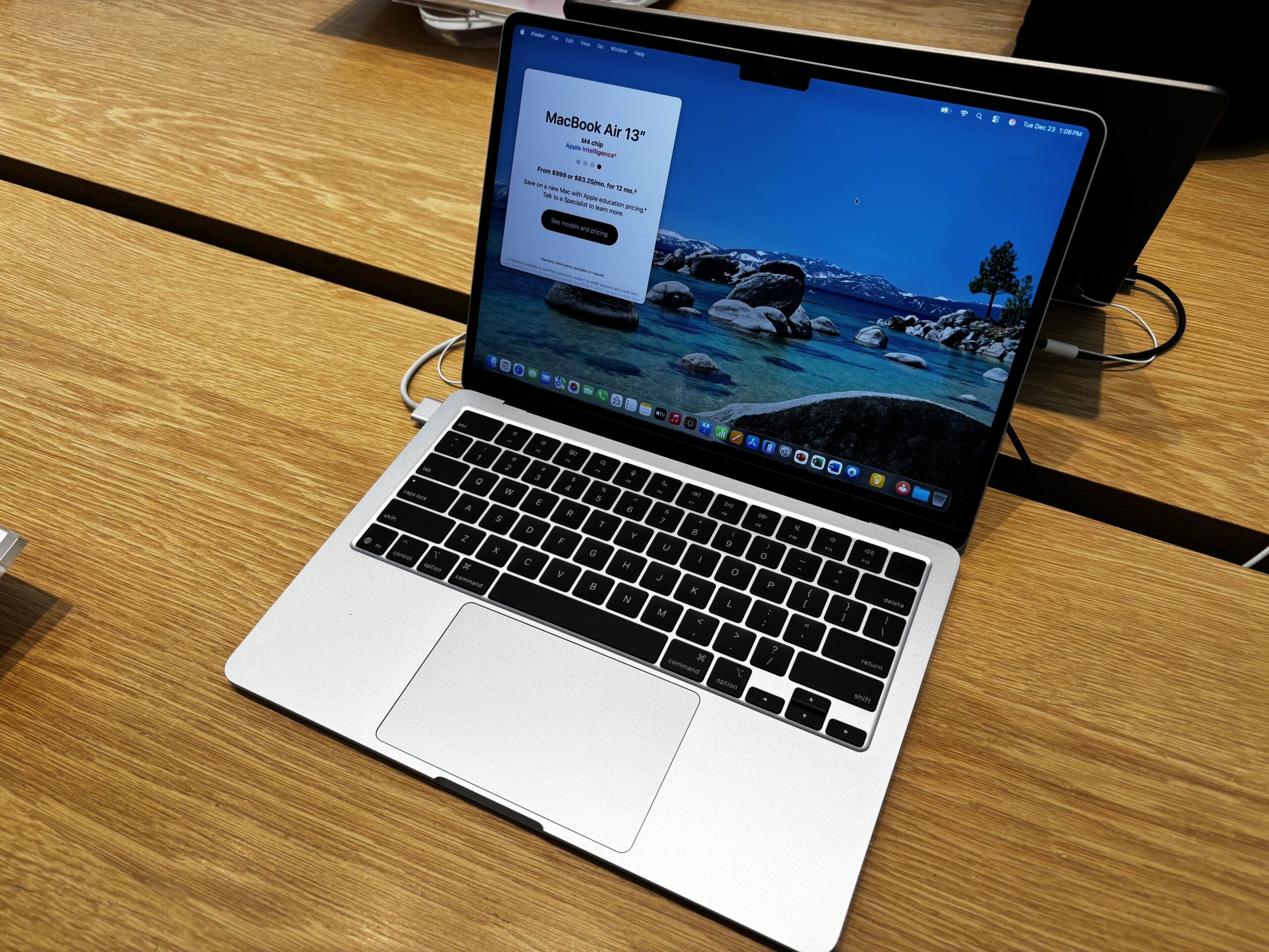 MacBook Air 13-inch with M4 chip open on a desk next to another Mac