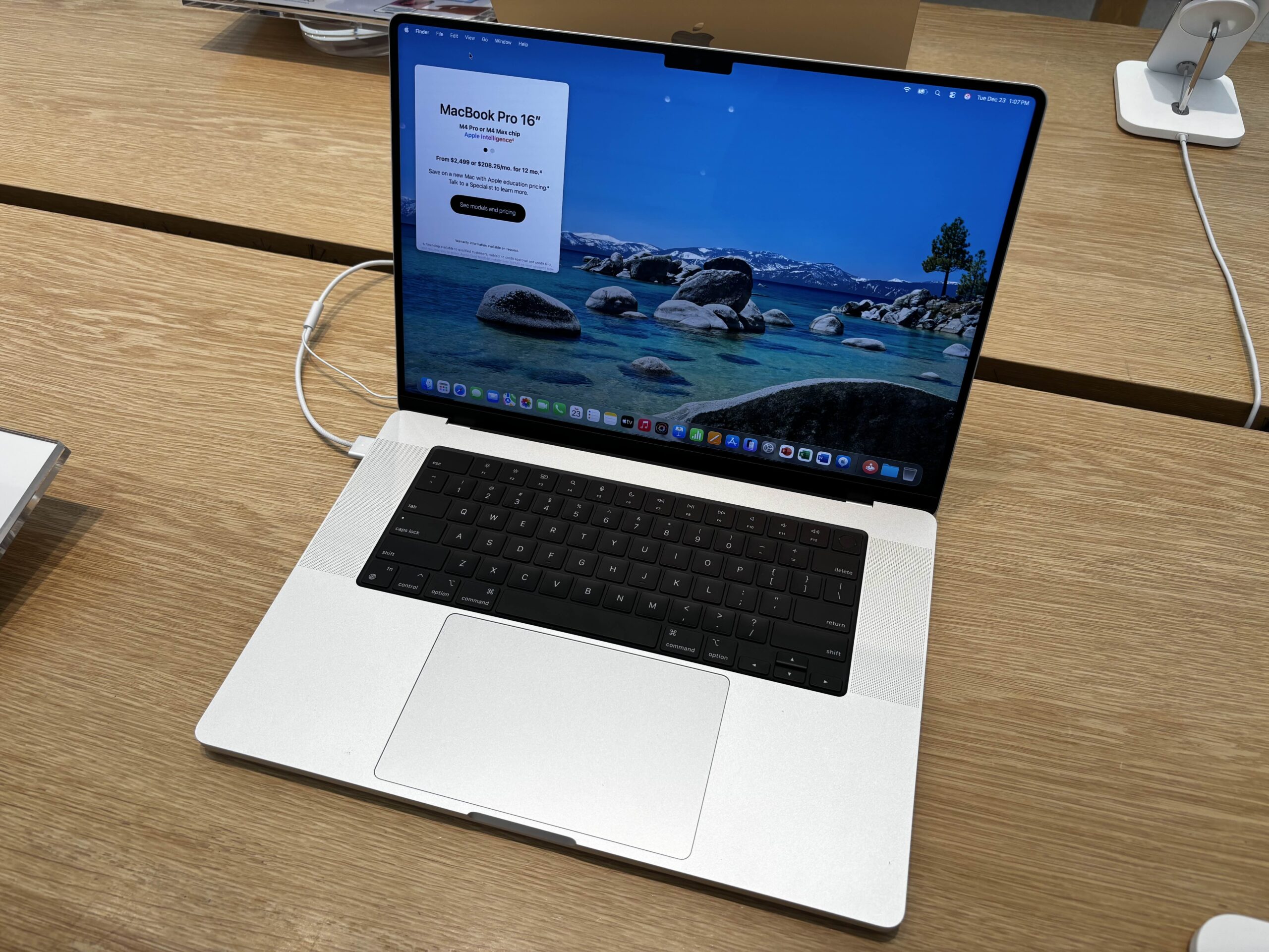 MacBook Pro showing macOS desktop and menu bar